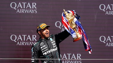 Mercedes' Lewis Hamilton celebrates with the trophy at Silverstone Circuit, Northamptonshire. Picture date: Sunday July 7, 2024. PA Photo. See PA Story AUTO British. Photo credit should read: David Davies/PA Wire.

RESTRICTIONS: Use subject to restrictions. Editorial use only, no commercial use without prior consent from rights holder.