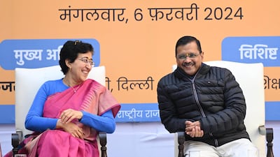 From left, Atishi with outgoing chief minister Arvind Kejriwal in New Delhi on Tuesday. Getty Images