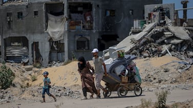 Internally displaced Palestinians leave with their belongings following an evacuation order issued by the Israeli army, in Khan Younis, southern Gaza Strip, 02 July 2024. EPA.