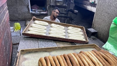 The Suneina family and their customers say being baked in the Old City gives Jerusalem kaek its unique taste