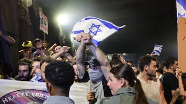 Protesters invade an highway during an anti-government rally calling for the release of Israelis held hostage by Palestinian militants in Gaza since October, in Tel Aviv on September 1, 2024.  Families of Israeli hostages have called for a nationwide general strike starting September 1 night to force the government to reach a deal to secure the release of captives still held in Gaza.  (Photo by JACK GUEZ  /  AFP)