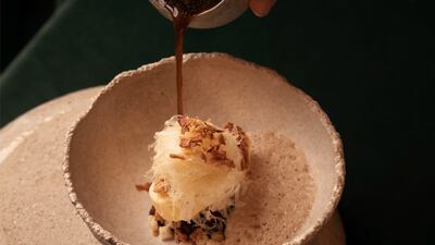 The modern onion 'soup' combines Comte cheese, caramelised onion broth and onion ice cream. Photo: Bord Eau by Nicolas Isnard