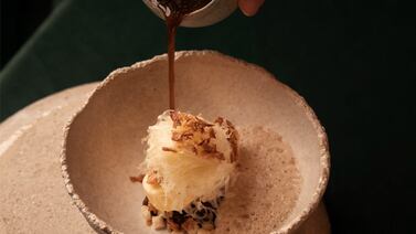 The modern onion 'soup' combines Comte cheese, caramelised onion broth and onion ice cream. Photo: Bord Eau by Nicolas Isnard