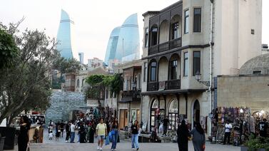 Baku's old city with the 'Flame Towers' in the background. Azerbaijan has used its fossil fuel revenue to build striking towers. Pawan Singh / The National