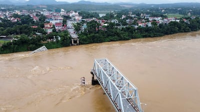 The Phong Chau Bridge in northern Vietnam, which partially collapsed during a typhoon. EPA