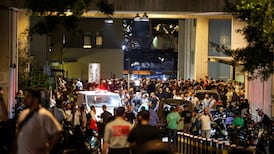 People gather outside American University of Beirut Medical Center (AUBMC) as more than 1,000 people, including Hezbollah fighters and medics, were wounded when the pagers they use to communicate exploded across Lebanon, according to a security source, in Beirut, Lebanon September 17, 2024.  REUTERS / Mohamed Azakir        TPX IMAGES OF THE DAY