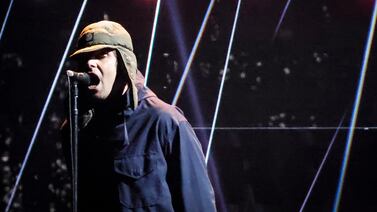 In his trademark high-necked parka, Liam Gallagher performs at the BRIT Awards 2022 ceremony. Along with his brother Noel, the pair are resurrecting Oasis. AFP