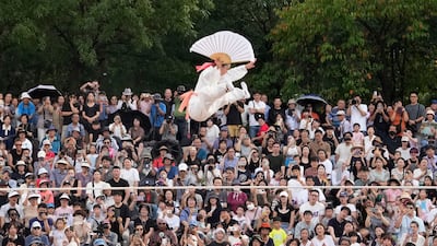 South Korean tightrope walker Seo Joo Hyang performs 'Jultagi' or Tightrope Walking, to celebrate the Chuseok, the Korean version of Thanksgiving at the Namsan Hanok village in Seoul, South Korea. AP 