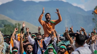 Supporters of India's opposition Congress party leader Rahul Gandhi, shout slogans during an election rally in the India-administered Kashmir region on September 4. Mr Ghandi's party has countered the new government’s agenda every step of the way. AP
