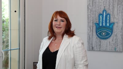 Anne Jackson, founder and chief executive of One Life Coaching, developed an abundance mindset from her childhood experience with money. Pawan Singh / The National