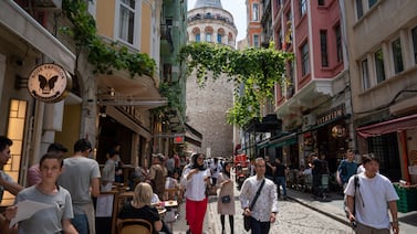 Cafe terraces line a street in Istanbul. Bloomberg