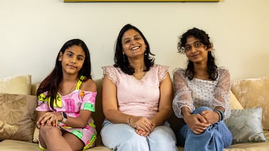 Shraddha Bhandari, centre, with her daughters Kaya, 9, left and Viha, 13, at their home in Mina Al Arab, Ras Al Khaimah. Christopher Pike for The National