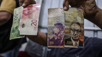 Worn-out banknotes in Deir Al Balah, Gaza. In the Gaza Strip, where the Israeli army destroyed many banks and ATMs, all branches have been closed for more than 11 months. Getty Images