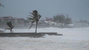 Hurricane Beryl hit Barbados in July. Scientists say man-made climate change is making extreme weather more common. AP