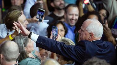 Democrat candidate for vice president Tim Walz at a campaign rally in Philadelphia on Tuesday. His place on the ticket may appeal to middle-class rural voters and those looking for a change of tack on the Israel-Gaza conflict. AP