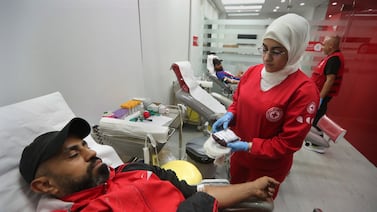 People donate blood for those who were injured by their exploding pagers, at a Red Cross centre in the southern city of Sidon, Lebanon, on September 17.  AP