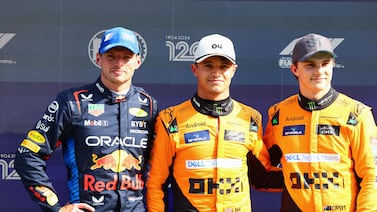 ZANDVOORT, NETHERLANDS - AUGUST 24: Second placed qualifier Max Verstappen of the Netherlands and Oracle Red Bull Racing, Pole position qualifier Lando Norris of Great Britain and McLaren and Third placed qualifier Oscar Piastri of Australia and McLaren pose for a photo in parc ferme after qualifying ahead of the F1 Grand Prix of Netherlands at Circuit Zandvoort on August 24, 2024 in Zandvoort, Netherlands. (Photo by Mark Thompson / Getty Images)