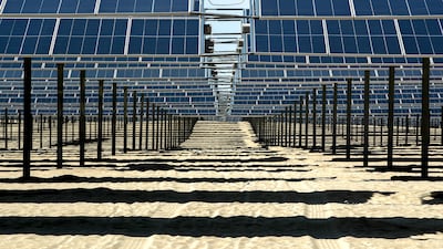 Al Dhafrah solar park in Abu Dhabi. Masdar aims to expand its capacity to at least 100 gigawatts of renewable energy by the end of the decade, from about 20 gigawatts at present. Victor Besa / The National