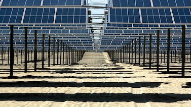 Al Dhafrah solar park in Abu Dhabi. Masdar aims to expand its capacity to at least 100 gigawatts of renewable energy by the end of the decade, from about 20 gigawatts at present. Victor Besa / The National