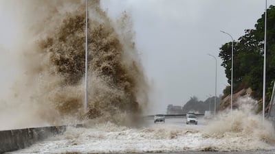 Huge waves lash a coastal road during a typhoon in China. The new fund is meant to cover effects of climate change where they can no longer be stopped. AP